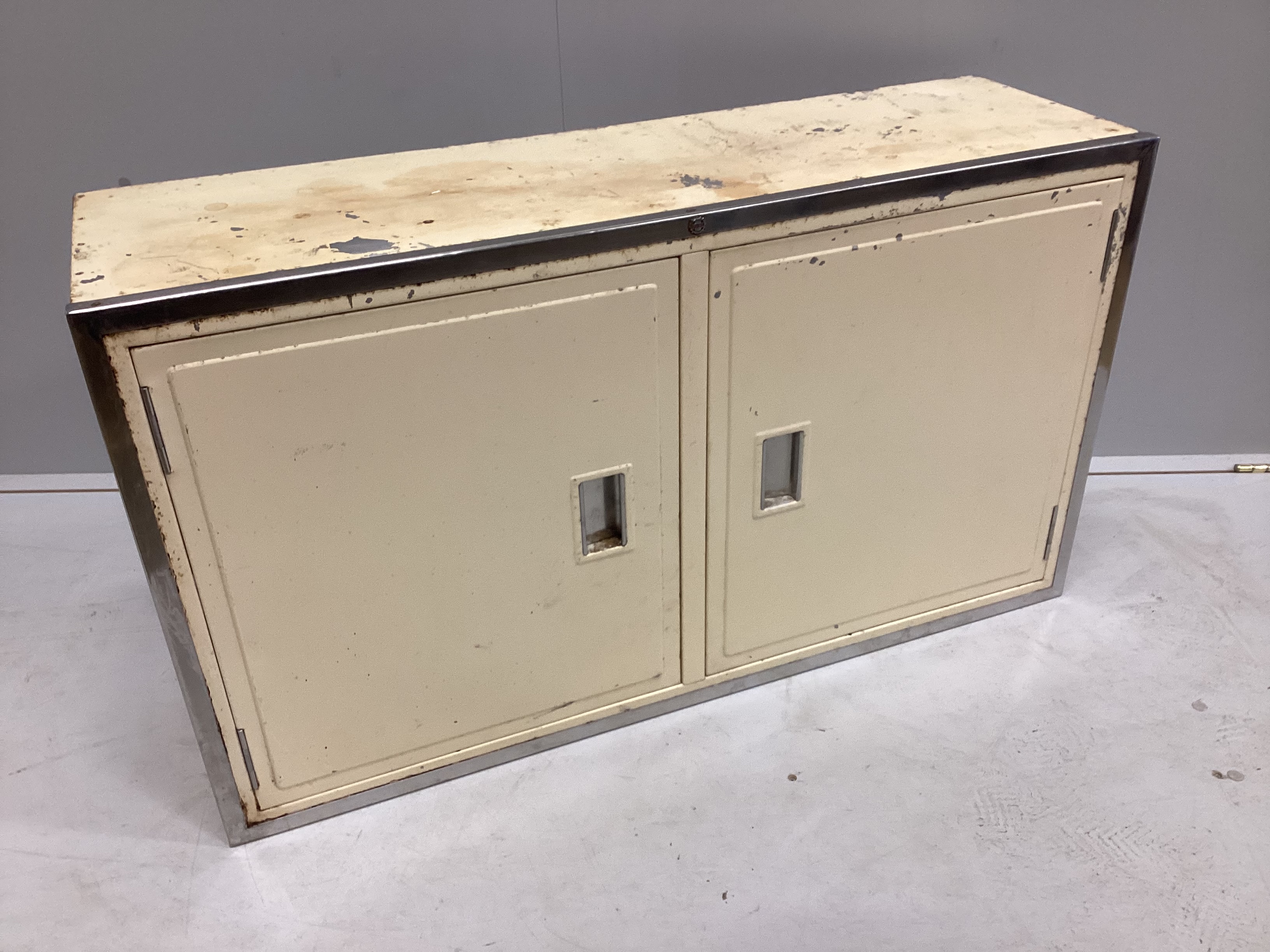 A 1950's metal two door kitchen wall cabinet, width 101cm, depth 30cm, height 59cm